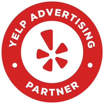 Red circular badge featuring the Yelp burst logo at the center, with Yelp Advertising Partner written in white around the edge, showcasing your official Yelp partnership.